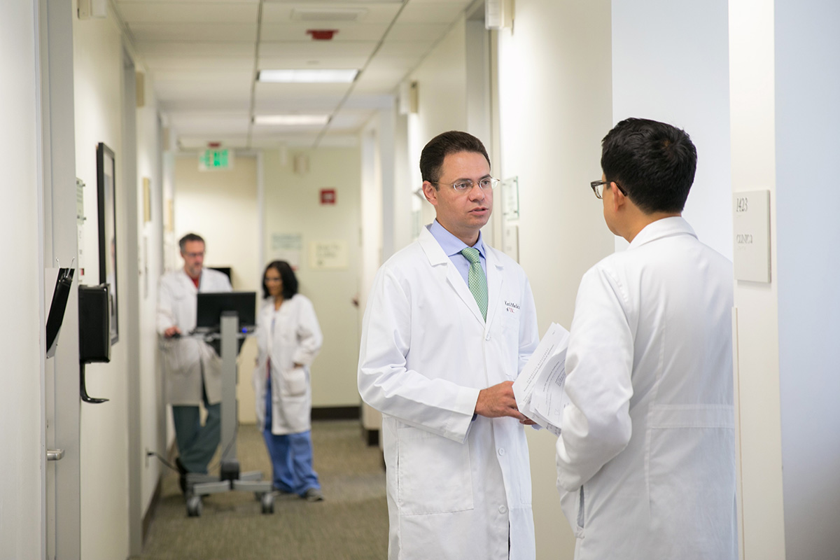 Keck Medicine of USC physicians and staff in a hallway