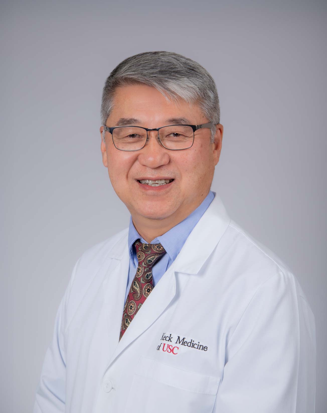 A headshot of Dr. David Liang.
