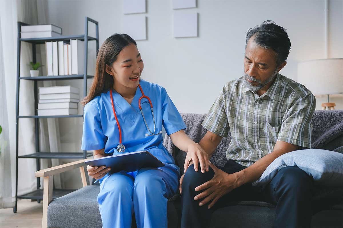 A doctor helps manage a patient's pain.