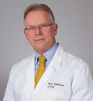 A portrait of Dr. Vaughn Starnes.