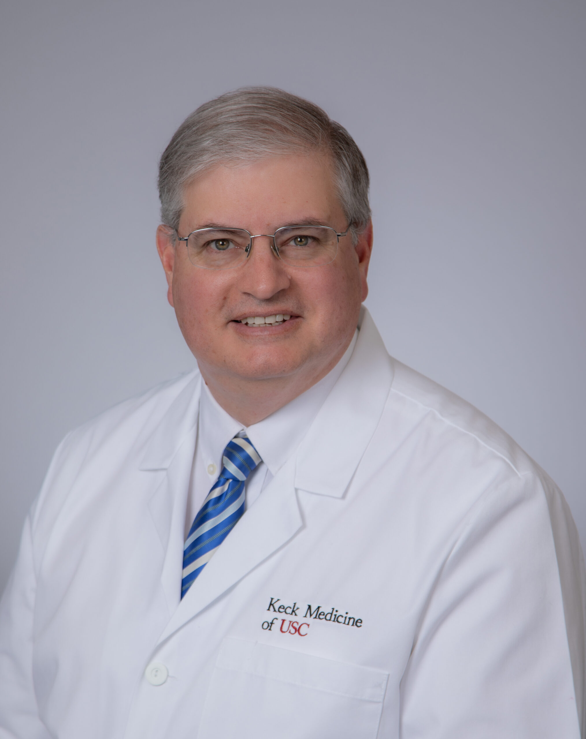 headshot of J. Dominic Femina, MD