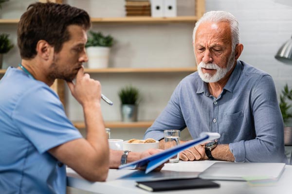 Two people looking at documents