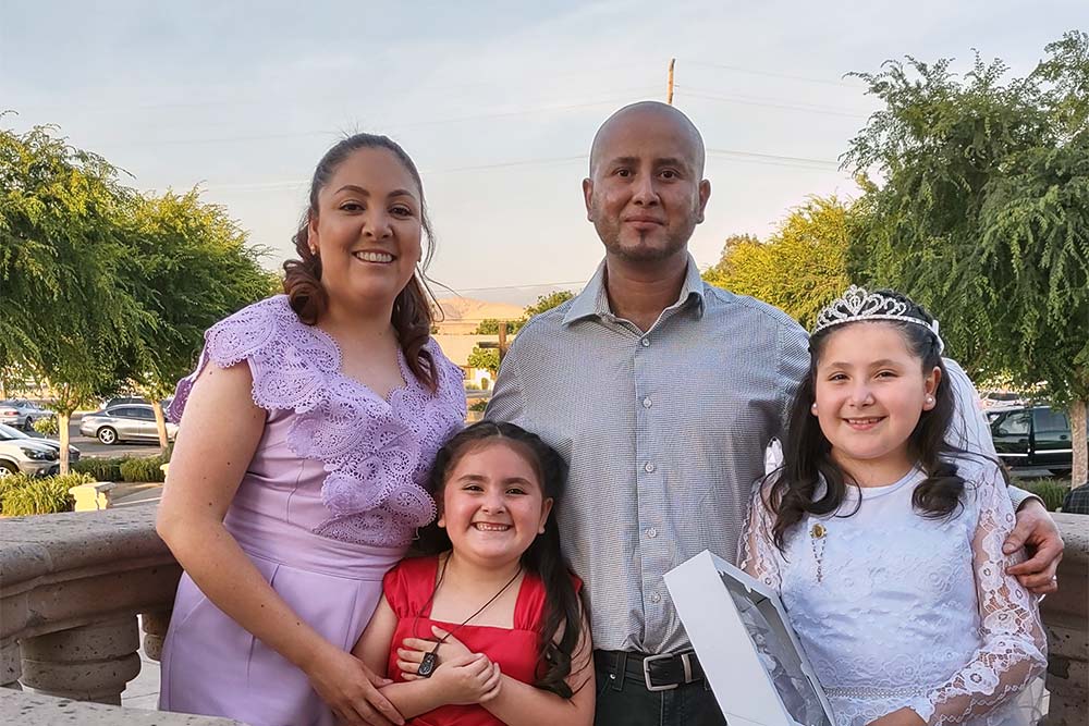 Vicente Samano and his wife, Perla Ramos, with their daughters.