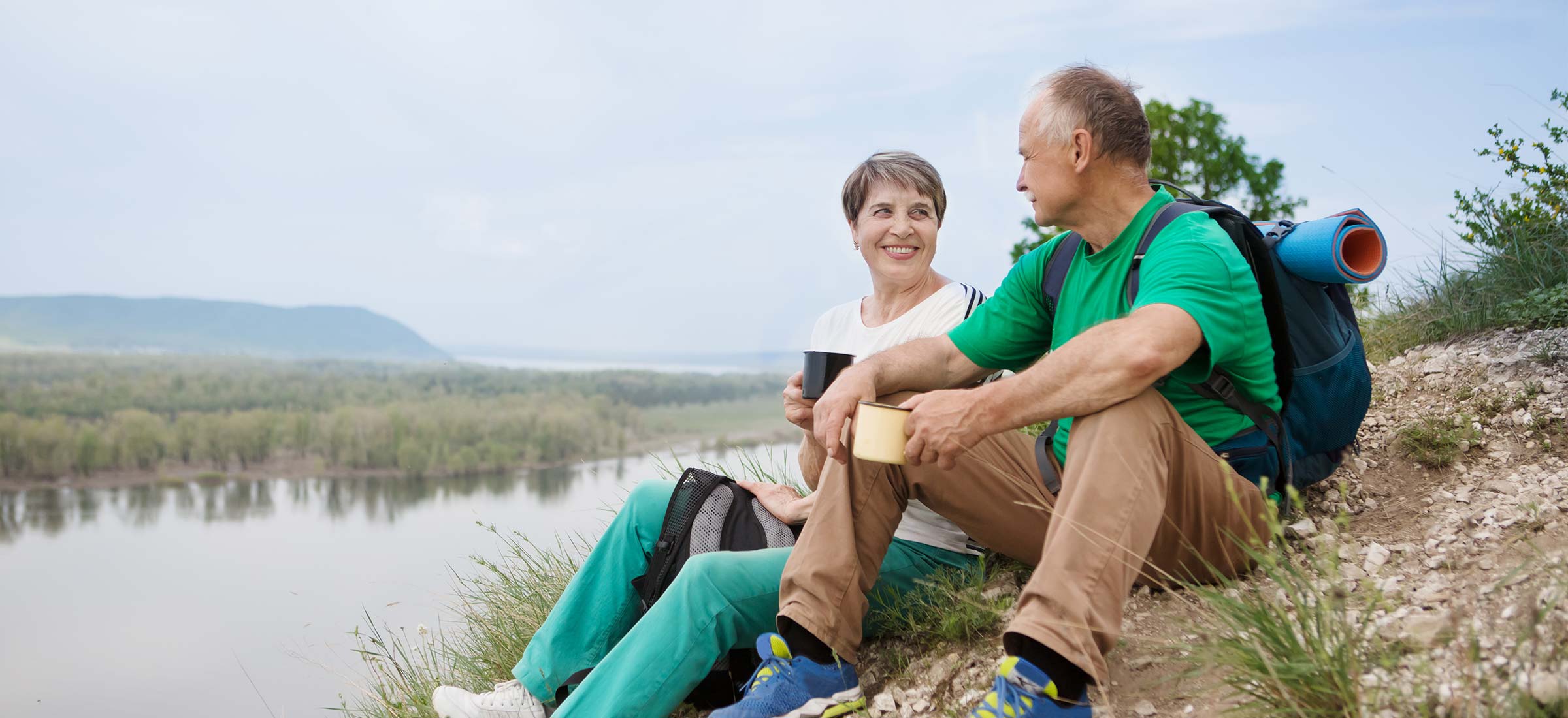 Two people taking a break from hiking