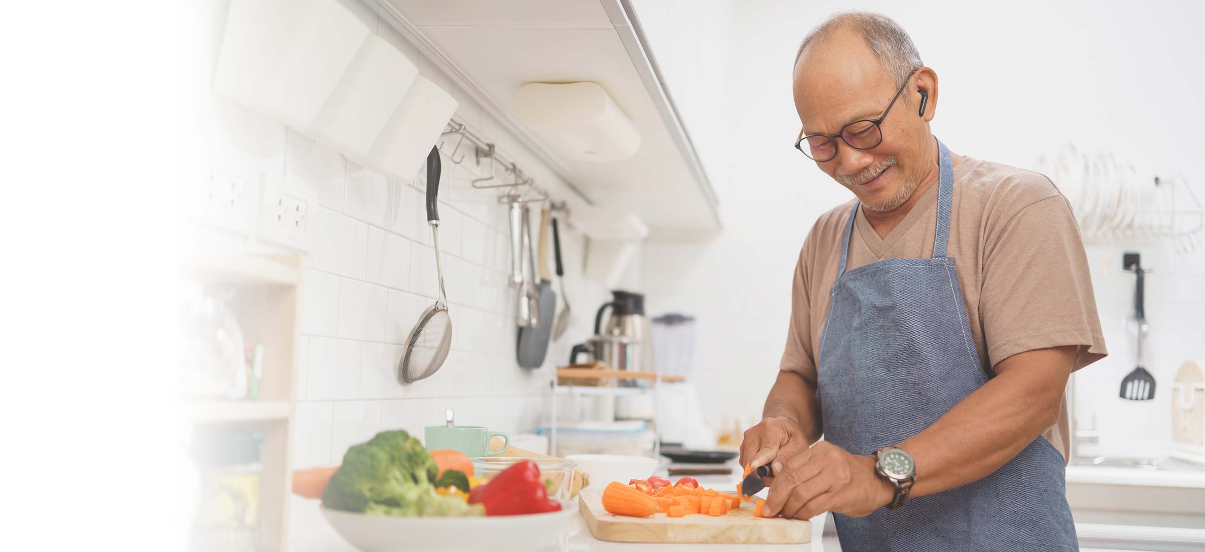 Person cutting food in the kitchen