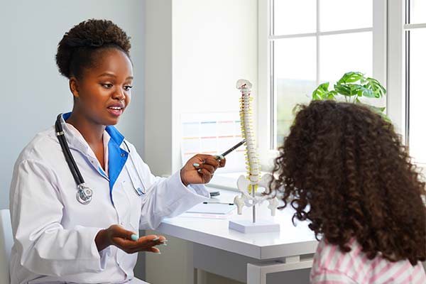 Child with physician