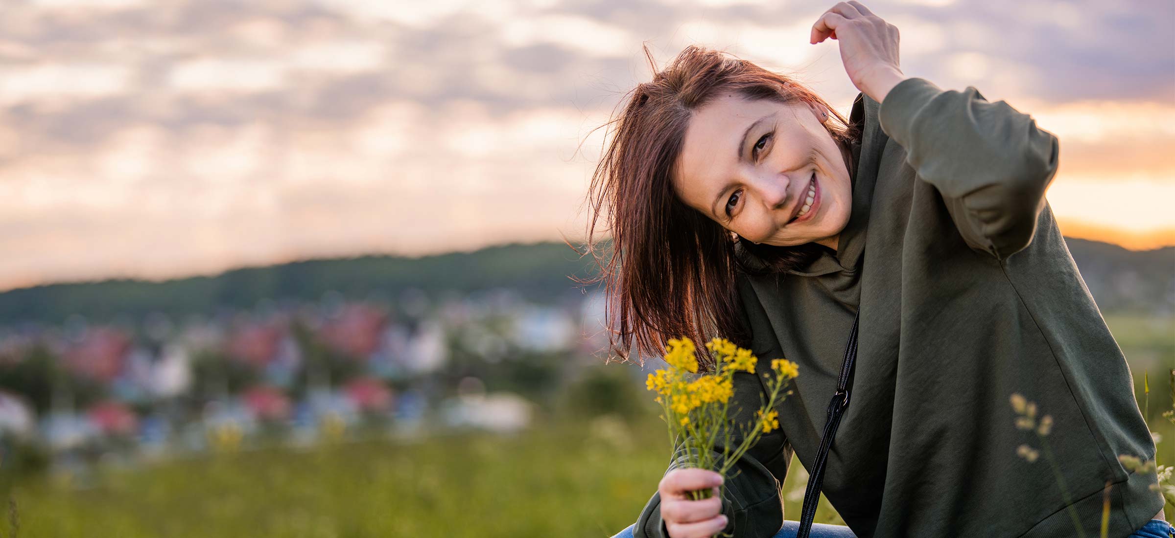Person holding a flower