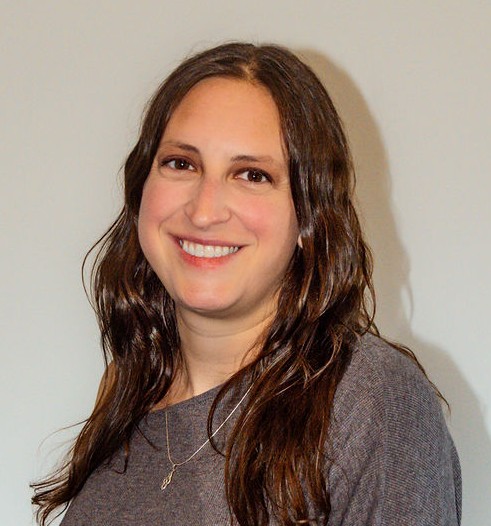 A headshot of Erin Laviola against a white background.
