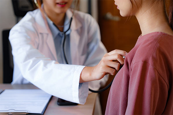 A genetic counselor treats a woman with Turner Syndrome.